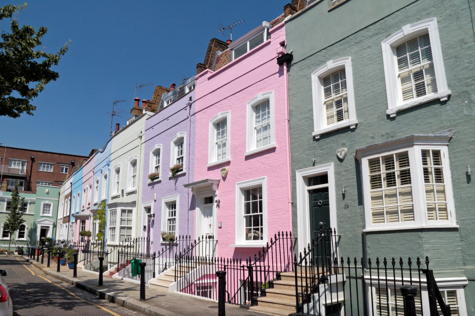 The quite beautiful colourful terraced houses on Bywater Street, just off the Kings Road in Chelsea, West London,SW3, UK.